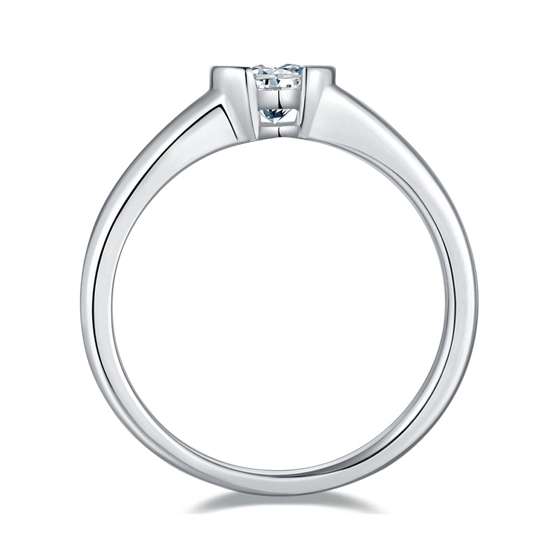 CARISSIE heart moissanite bezel ring, side profile displaying the low-profile setting and tapered polished shank.