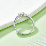 CARISSIE heart moissanite bezel ring, elevated rear view revealing the interior gallery and clean silver finish.