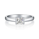 CARISSIE Asscher bezel engagement ring, direct front view displaying the geometric symmetry of the moissanite.