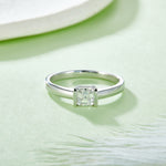 CARISSIE Asscher bezel engagement ring, low-angle view emphasizing the sleek profile and minimalist design details.