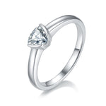 CARISSIE trillion moissanite bezel ring, angled view highlighting the triangular stone and smooth silver-tone band