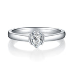 CARISSIE pear moissanite bezel engagement ring, front view showcasing the brilliant center stone in a minimalist setting