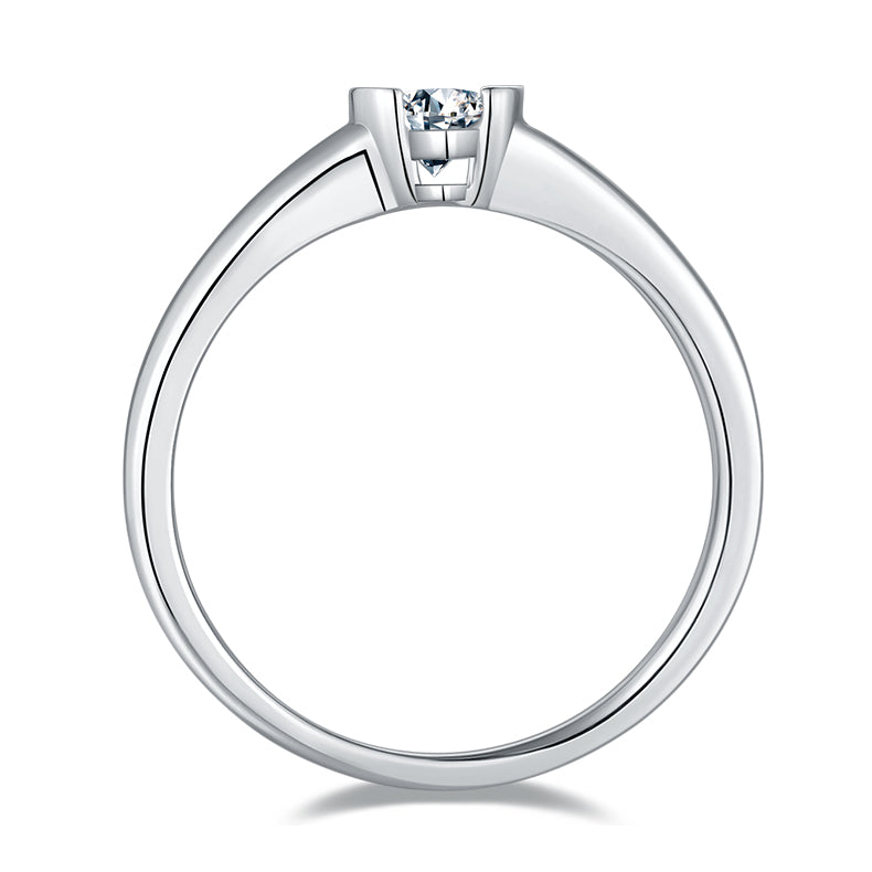 CARISSIE pear moissanite bezel engagement ring, top-down perspective revealing the smooth interior of the polished band