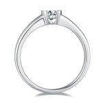 CARISSIE pear moissanite bezel engagement ring, top-down perspective revealing the smooth interior of the polished band