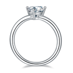 CARISSIE trillion cut ring, top-down perspective showing the interior of the sleek silver shank and prong placement