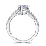 CARISSIE heart solitaire engagement ring, top-down view revealing the open gallery design and prong structure beneath the gem