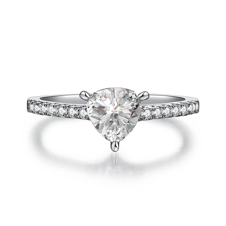 CARISSIE trillion solitaire engagement ring, front view highlighting the sharp corners of the center stone and surrounding pave accents