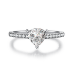 CARISSIE trillion solitaire engagement ring, front view highlighting the sharp corners of the center stone and surrounding pave accents