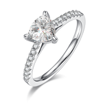 CARISSIE trillion solitaire engagement ring, angled side view showing pavé band and triangular moissanite in silver-tone setting