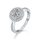 CARISSIE round moissanite halo engagement ring, angled view highlighting double halo and pavé split shank