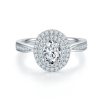 CARISSIE oval moissanite halo engagement ring, front view displaying the brilliant center stone surrounded by two rows of pavé accents