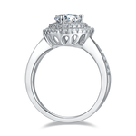 CARISSIE Heart Moissanite Halo Engagement Ring, side profile revealing heart-shaped openwork cutouts in the gallery rail