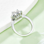 CARISSIE Heart Moissanite Halo Engagement Ring, rear angle displaying the under-gallery detail and inner band stamp
