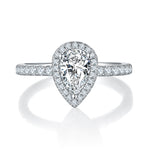 CARISSIE pear moissanite halo engagement ring, front view highlighting teardrop silhouette and prong setting