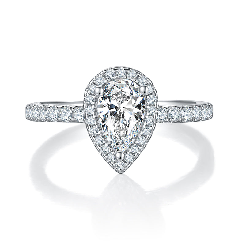 CARISSIE pear moissanite halo engagement ring, front view highlighting teardrop silhouette and prong setting