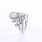 CARISSIE pear moissanite halo ring, three-quarter perspective of the classic white stone design with full pavé coverage