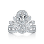 CARISSIE pear moissanite halo ring, front view displaying the teardrop stone surrounded by a diamond halo and pavé band
