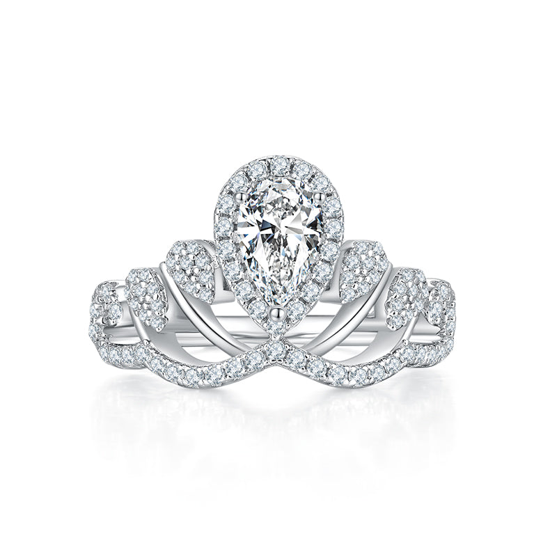 CARISSIE pear moissanite halo engagement ring, direct front view highlighting the symmetrical double-halo setting and split shank design
