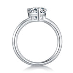 CARISSIE heart moissanite solitaire ring, side profile revealing the open gallery structure beneath the prongs