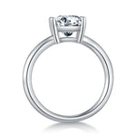 CARISSIE Princess Solitaire Engagement Ring, top-down view displaying the circular shank and high-profile prong setting
