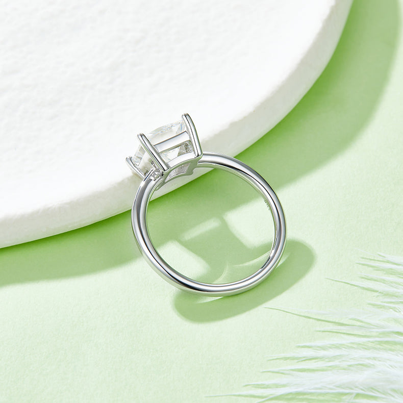CARISSIE Princess Solitaire Engagement Ring, side profile view revealing the open gallery beneath the square gemstone