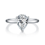 CARISSIE pear moissanite solitaire ring, top-down perspective showing the three-prong setting and tapered band design