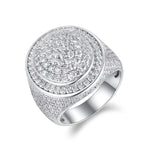 CARISSIE round moissanite pavé ring, angled view showing concentric tiers of stones and smooth silver-tone metal rim
