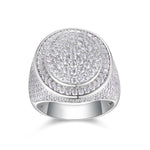 CARISSIE round moissanite statement ring, front view displaying fully iced circular face with dense brilliant-cut stone setting