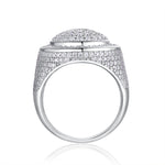 CARISSIE round moissanite signet ring, side profile revealing domed top and pavé-set band extending to the shank