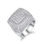 CARISSIE round moissanite statement ring, angled view showing multi-tiered cushion face and pavé-set stones in white metal
