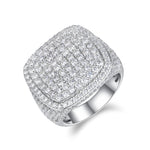 CARISSIE cushion moissanite statement ring, angled view showing tiered pavé setting and polished silver-tone band