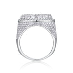 CARISSIE round moissanite statement ring, side profile showing the heavy pavé setting extending down the shoulders to the smooth polished band