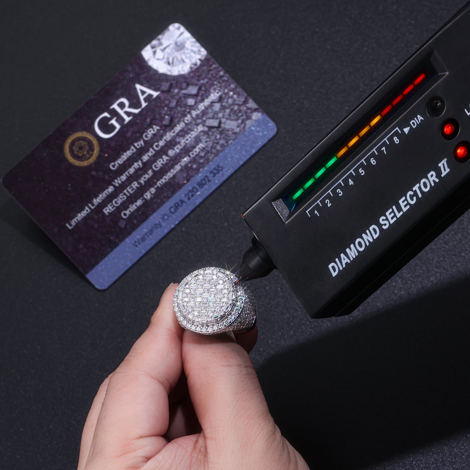 CARISSIE round moissanite statement ring, being tested with a diamond selector tool to verify thermal conductivity and authenticity
