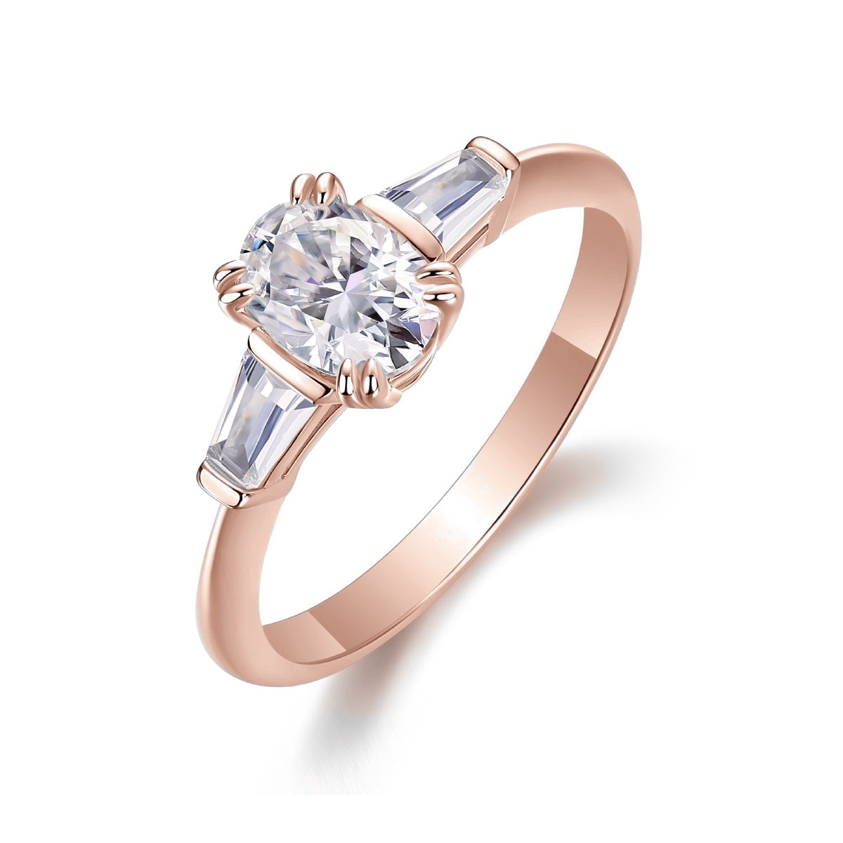 Ainsley Oval Moissanite Three Stone Engagement Ring in 18K rose gold plating