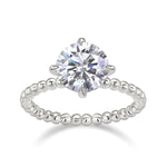 Amara Round Moissanite Solitaire Engagement Ring in 18K white gold plating, front view