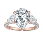 Amira Pear Moissanite Three Stone Engagement Ring in 18K rose gold plating, front view