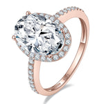 Angela Oval Moissanite Halo Engagement Ring in 18K rose gold plating, angled view