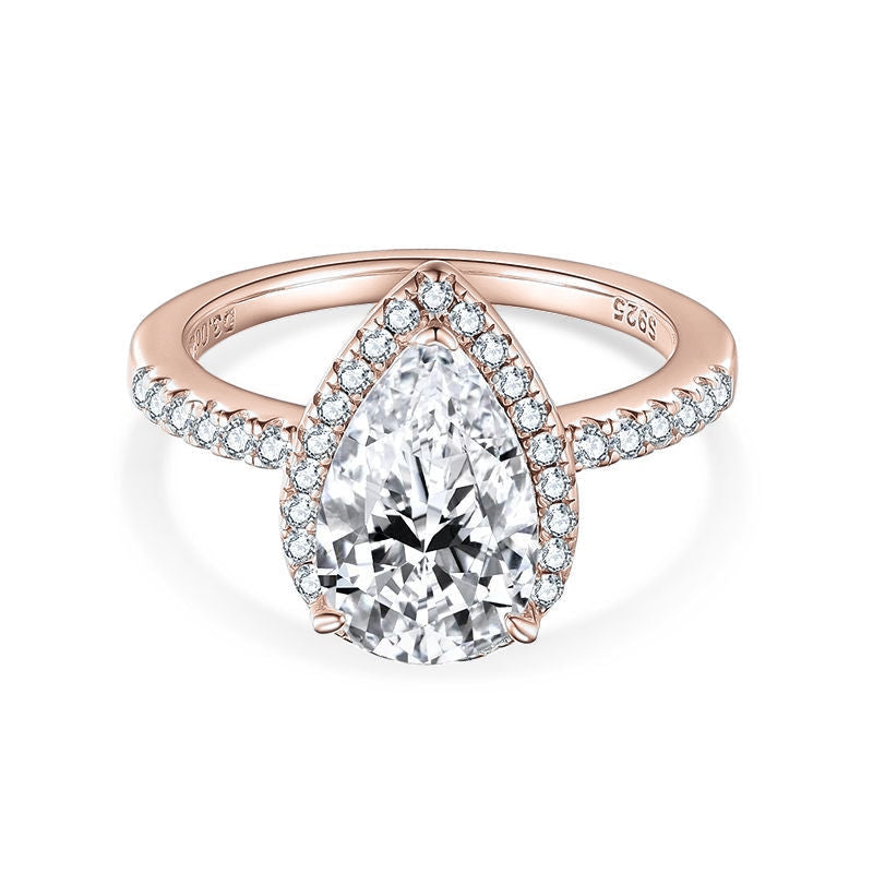April Pear Moissanite Halo Engagement Ring in 18K rose gold plating, front view
