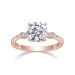 Cassia Round Moissanite Side Stone Engagement Ring, front view