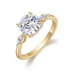 Cassia Round Moissanite Side Stone Engagement Ring in 18K yellow gold plating