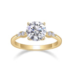 Cassia Round Moissanite Side Stone Engagement Ring, front view