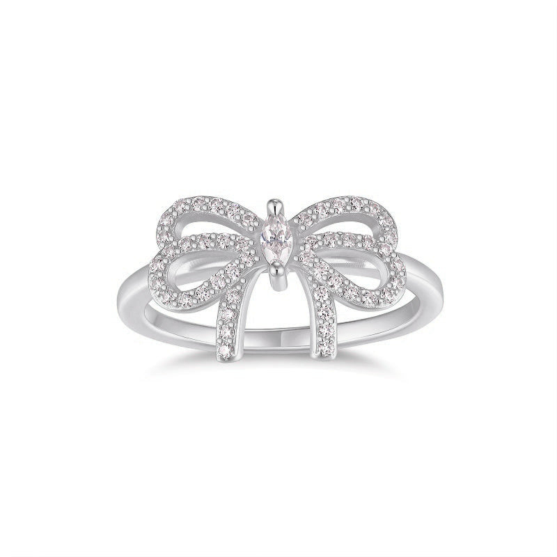 Effie Marquise Moissanite Pavé Bow Ring in 18K white gold plating, front view