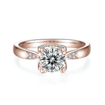 Eliana Round Moissanite Hidden Heart Engagement Ring in 18K rose gold plating, front view