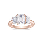 Eloise Emerald Cut Moissanite Three Stone Engagement Ring in 18K rose gold plating, front view