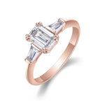 Everly Emerald Cut Moissanite Three Stone Engagement Ring in 18K rose gold plating