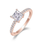 Gigi Princess Cut Moissanite Solitaire Engagement Ring in 18K rose gold plating, angled view