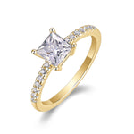 Gigi Princess Cut Moissanite Solitaire Engagement Ring in 18K yellow gold plating, angled view
