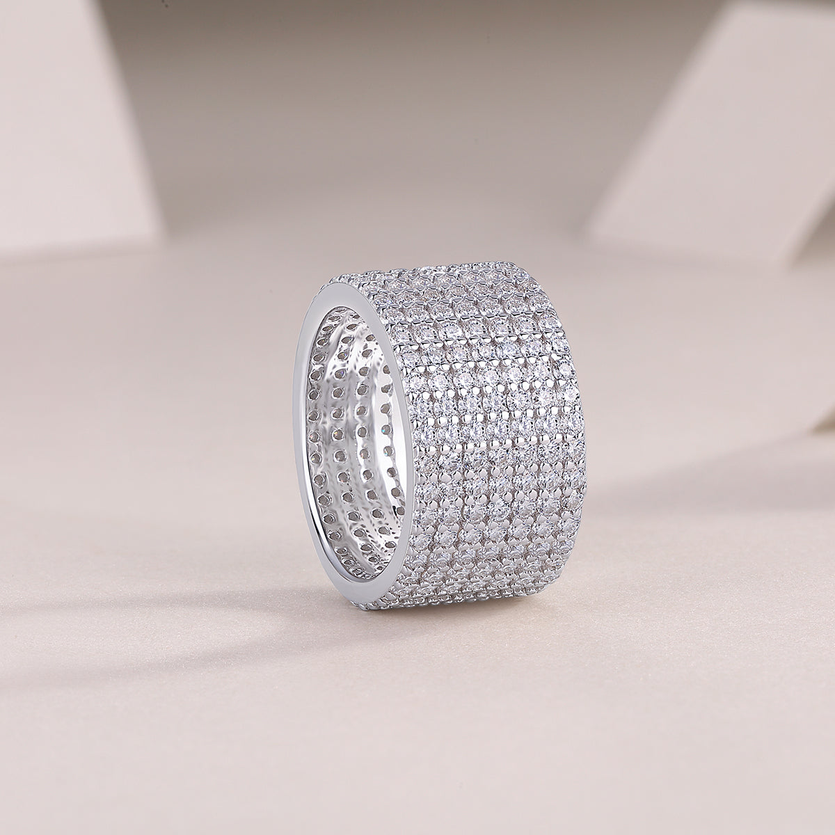 Harriet Moissanite Wide Pavé Eternity Band in 18K white gold plating, angled view