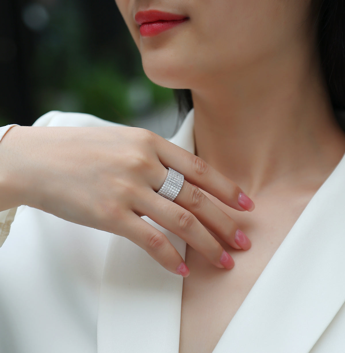 Harriet Moissanite Wide Pavé Eternity Band in 18K white gold plating, worn on the hand