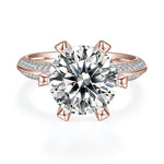 Irina Round Moissanite Claw Prong Pavé Engagement Ring in 18K rose gold plating, front view